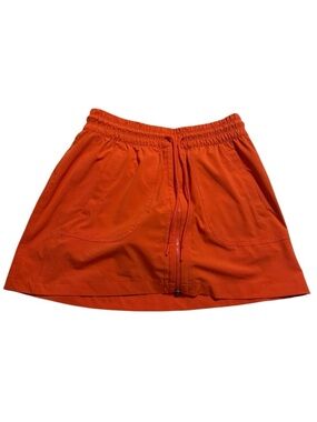 ATHLETA Bright Orange Drawstring Skirt with shorts underneath